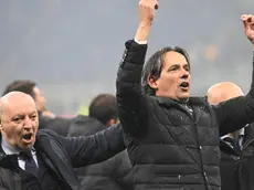 Inter's coach Simone Inzaghi (R) and CEO Giuseppe Marotta celebrate at the end of the Italian Serie A soccer match between Ac Milan and Inter Milan at the Giuseppe Meazza stadium in Milan, Italy, 22 April 2024. ANSA/DANIEL DAL ZENNARO