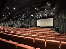 Interno della rinnovata Sala Darsena nella ex area arena del palazzo del Cinema, Venezia, 25 agosto 2014. ANSA/ANDREA MEROLA