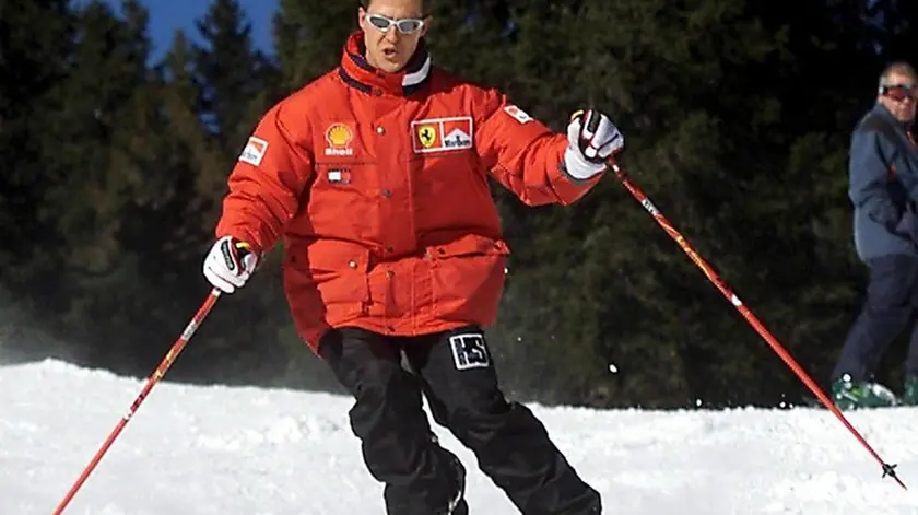 epa04260528 (FILE) A file picture dated 11 January 2000 shows German the Formula One Ferrari driver Michael Schumacher carving a turn while skiing at the Italian resort of Madonna di Campiglio, Italy. Formula 1 racer Michael Schumacher is no longer in a coma, it was reported 16 June 2014 by his manager Sabine Kehm, six and a half months after he suffered a serious skiing injury. Reports also state he has left the Grenoble hospital he was staying in. EPA/ERCOLE COLOMBO