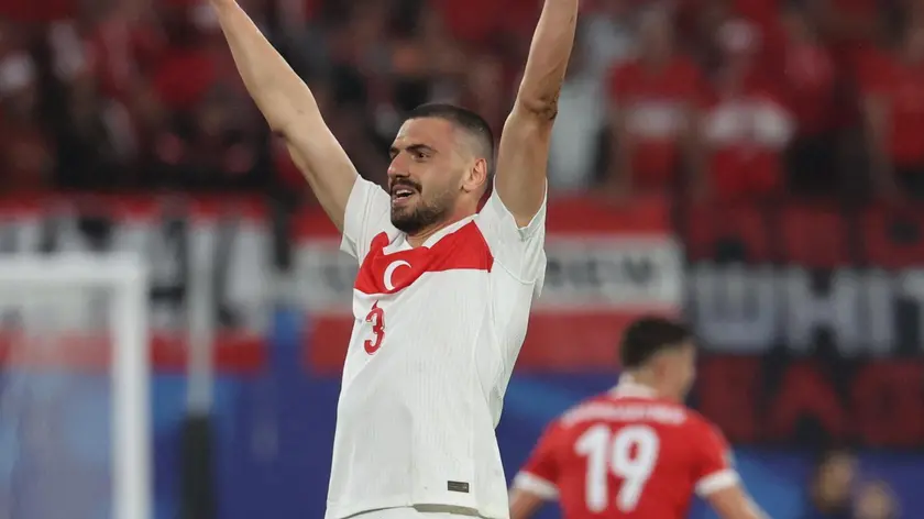 epa11453683 Merih Demiral of Turkey celebrates scoring the 2-0 lead during the UEFA EURO 2024 Round of 16 soccer match between Austria and Turkey, in Leipzig, Germany, 02 July 2024. EPA/ABEDIN TAHERKENAREH
