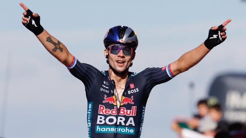 epa11589766 Slovenian Primoz Roglic of Bora team celebrates his victory in the 19th stage of La Vuelta a Espana cycling race over 173,5 km between Logrono city and the top of Moncalvillo in northern Spain, 06 September 2024. EPA/JAVIER LIZON