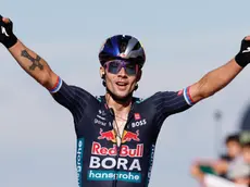 epa11589766 Slovenian Primoz Roglic of Bora team celebrates his victory in the 19th stage of La Vuelta a Espana cycling race over 173,5 km between Logrono city and the top of Moncalvillo in northern Spain, 06 September 2024. EPA/JAVIER LIZON