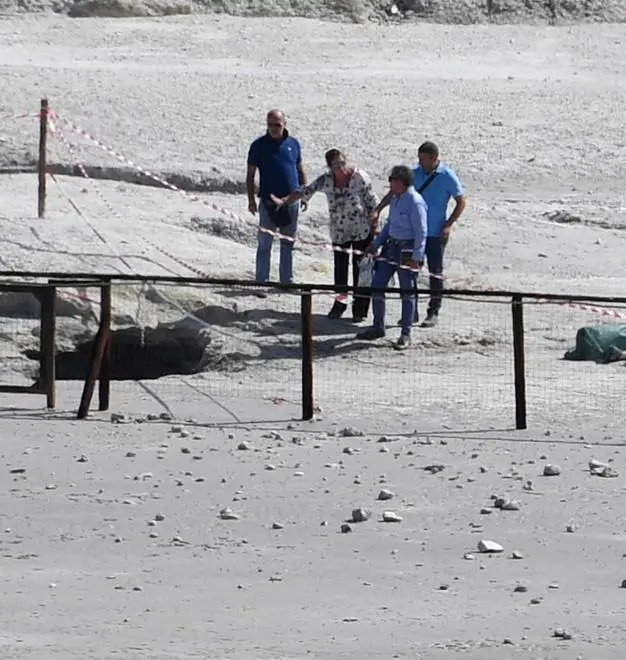 The coffin of three people died in the crater stand under the green cloth at Pozzuoli, Naples, Italy, 12 settembre 2017. A couple and an 11-year-old boy have died at the Solfatara volcanic crater at Pozzuoli, near Naples, police said on Tuesday. Another child, aged seven, survived, the sources said. The woman was 42 and the man was 45. ANSA/CIRO FUSCO