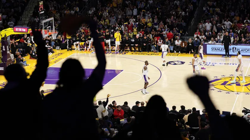 epa11306159 Fans react after the Los Angeles Lakers score during the second half of the NBA playoffs round one, game four between the Denver Nuggets and Los Angeles Lakers in Los Angeles, California, USA, 27 April 2024. EPA/ALLISON DINNER SHUTTERSTOCK OUT
