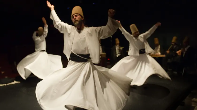 22 Jun 2011, Venice, Italy --- A whirling Dervish of the Galata Mevlevi Ensemble perfoms at Auditorium Candiani ' --- Image by © Marco Secchi/Corbis