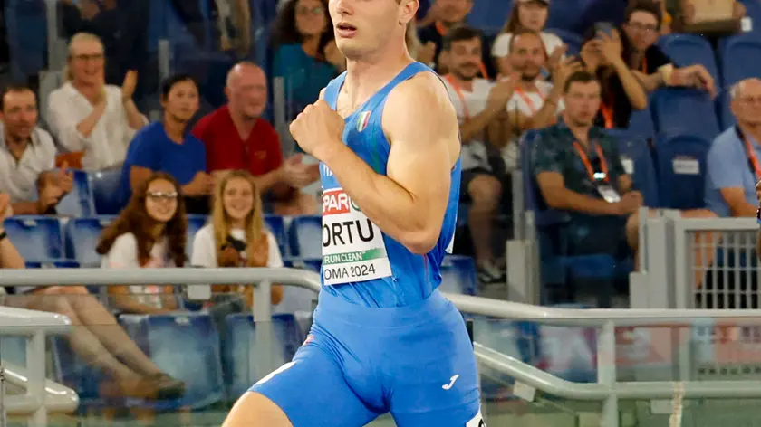 Filippo Tortu of Team Italy competes in the Men's 200 Metres Semi-Final 3 during the European Athletics Championship at Olimpico Stadium in Rome, Italy, 09 June 2024. ANSA/FABIO FRUSTACI