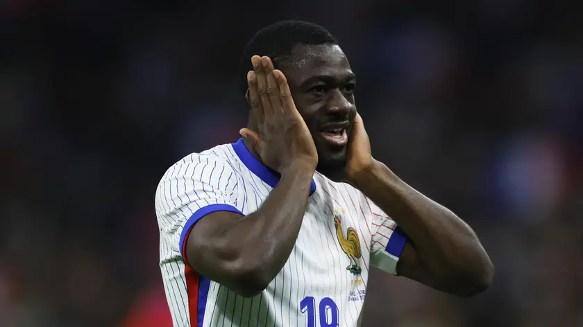 epa11245438 France's Youssouf Fofana celebrates after scoring the 1-1 goal during the friendly international soccer match between Slovenia and Portugal in Ljubljana, Slovenia, 26 March 2024. EPA/ANTONIO BAT