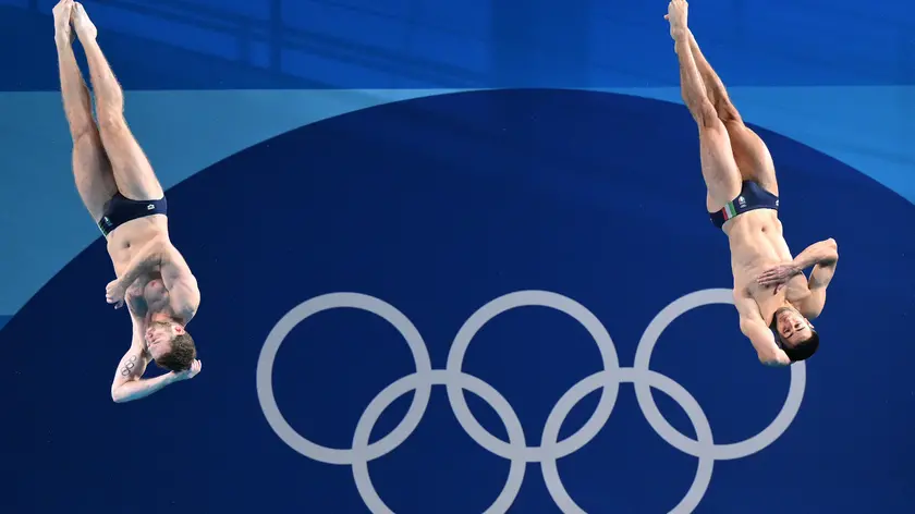 Italian Lorenzo Marsaglia (L) and Giovanni Tocci compete in the Men's Synchronised 3M Springboard Final of the Diving competition during the Paris 2024 Olympic Games at the Aquatics Centre in Paris, France, 02 August 2024. Summer Olympic Games will be held in Paris from 26 July to 11 August 2024. ANSA/ETTORE FERRARI