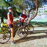In alto i coniugi Sebastiano Visintin e Liliana Resinovich in una delle loro tante gite in bicicletta.