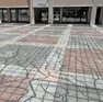 Le mattonelle di piazza del Sindacato con gli evidenti segni preparatori del murale, che poi è stato realizzato al parco della Repubblica (foto Piran)