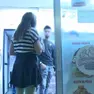 La giornalista Rai Chiara Giannini mentre entra nel locale in piazzale staizone subito prima dell'aggressione