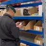 I controlli della Guardia di Finanza in un capannone in zona industriale