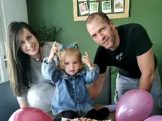 La piccola Ludovica con mamma e papà