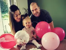 Ludovica con papà e mamma quando ha compiuto un anno