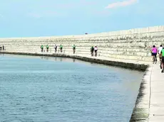 Comitive di turisti a Pellestrina