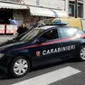 Una pattuglia di carabinieri davanti a un supermercato in una foto di repertorio (Bruni)