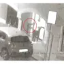 Nel fermo immagine del filmato Silvia Maran che sferra un calcio all’avvocato Piero Longo