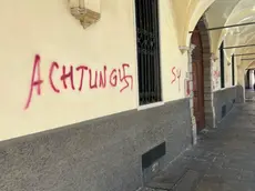 Una delle scritte in via Altinate