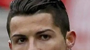 epa04607551 Real Madrid's Portuguese striker Cristiano Ronaldo gestures during their Spanish Primera Division league soccer match played between Atletico Madrid and Real Madrid played at the Vicente Calderon stadium in Madrid, Spain, 07 February 2015. EPA/JUANJO MARTIN