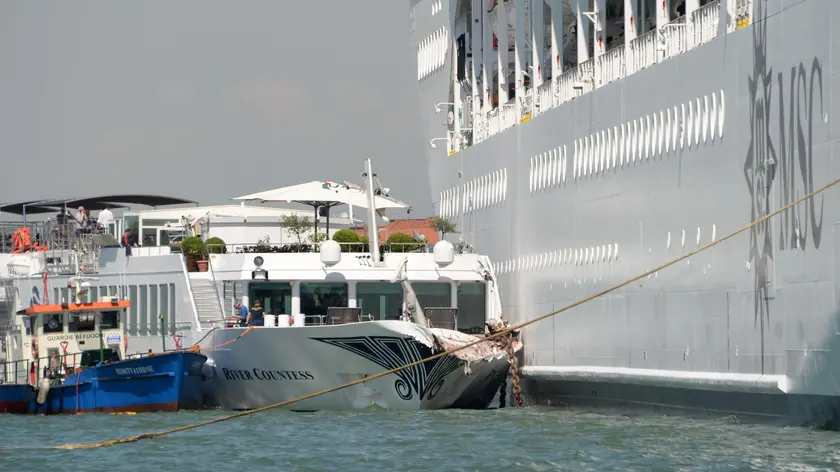 The MSC cruise ship Opera is seen after the collision with a tourist boat, in Venice, Italy, 02 June 2019. The cruise ship smashed into a dock located on the Giudecca canal in Venice this morning. Tugs could not maintain control of the MSC cruise ship as it violently struck the dock and then struck the stern of the 'River Countess' tourist boat which was docked. Four people were taken to the hospital. ANSA/ ANDREA MEROLA
