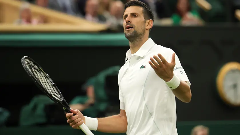 epa11467366 Novak Djokovic of Serbia gestures to the crowd as he plays against Holger Rune of Denmark (unseen) during their round of 16 match at the Wimbledon Championships, Wimbledon, Britain, 08 July 2024. EPA/TIM IRELAND EDITORIAL USE ONLY