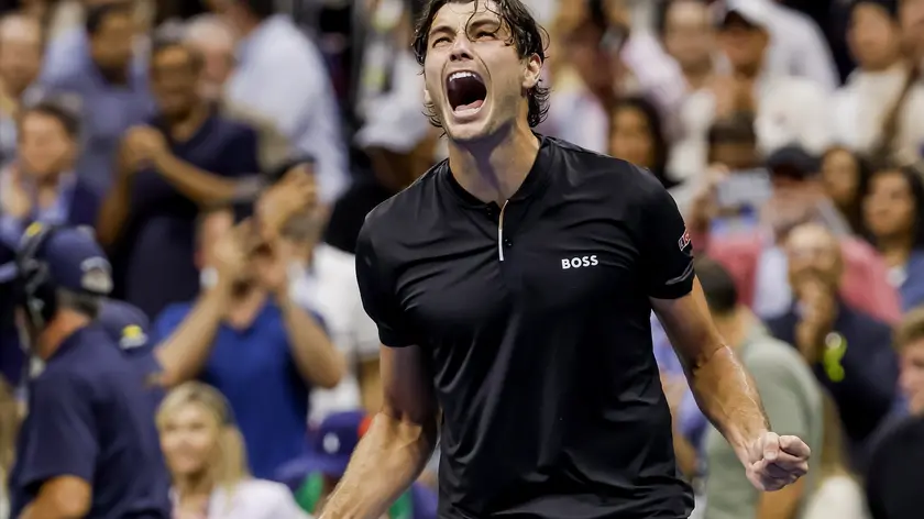 epaselect epa11590656 Taylor Fritz of the United States reacts after defeating Frances Tiafoe of the United States during their semifinal match of the US Open Tennis Championships at the USTA Billie Jean King National Tennis Center in Flushing Meadows, New York, USA, 06 September 2024. The US Open tournament runs from 26 August through 08 September. EPA/JOHN G. MABANGLO