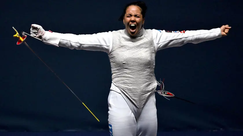 epa10770027 Alice Volpi of Italy celebrates after winning against Lee Kiefer of the United States in the women's individual foil semifinal at the FIE World Fencing Championship in Milan, Italy, 26 July 2023. EPA/Tibor Illyes HUNGARY OUT