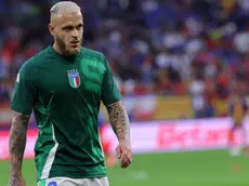 epa11426444 Federico Dimarco of Italy warms up before the UEFA EURO 2024 group B soccer match between Spain and Italy, in Gelsenkirchen, Germany, 20 June 2024. EPA/OLIVIER MATTHYS