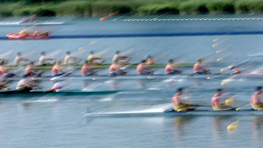 epaselect epa11515113 Boats compete in the Men's Eight Repechages of the Rowing competitions in the Paris 2024 Olympic Games, at the Vaires-sur-Marne Nautical Stadium in Vaires-sur-Marne, France, 01 August 2024. EPA/MAXIM SHIPENKOV