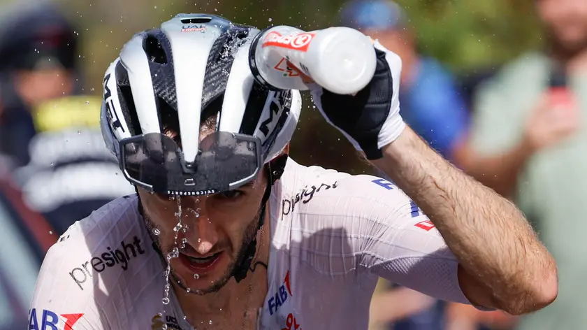 epa11564284 British rider Adam Yates of UAE Team Emirates in action during the 9th stage of Spain's Cycling Vuelta in Granada, 25 August 2024. The 9th stage is a 178.5km route from Motril to Granada. EPA/Javier Lizon