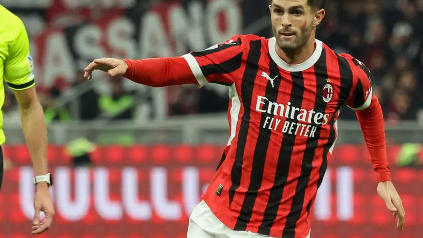 AC Milan's mildfielder Christian Pulisic during the Italian Serie A soccer match AC Milan vs Juventus FC at Giuseppe Meazza Stadium in Milan, Italy, 23 November 2024. ANSA / ROBERTO BREGANI
