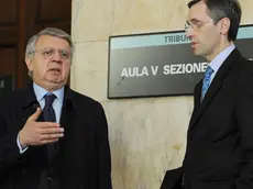 I legali di Silvio Berlusconi Niccolo' Ghedini (d) e Piero Longo in un'immagine del 12 aprile 2010 "Non abbiamo ancora deciso, dobbiamo ancora valutare". Così l'avvocato Piero Longo, uno dei difensori di Silvio Berlusconi ha risposto ai cronisti che, in una pausa dell'udienza Mediatrade, gli hanno chiesto se sarà presente mercoledì assieme al collega Niccolò Ghedini, per la prima udienza del processo sul caso Ruby 4 aprile 2011. ANSA/ DANIEL DAL ZENNARO