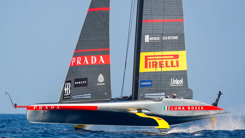 epa11559845 Luna Rossa Prada Pirelli compete in a match race during the Preliminary Regatta of the 37th America's Cup, in Barcelona, Spain, 22 August 2024. EPA/Siu Wu