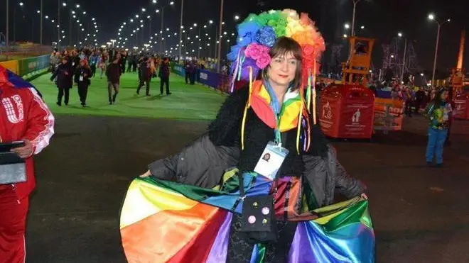 Italian transgender Vladimir Luxuria poses for a photo prior she attends women's Olympic hockey semifinals between Canada and Switzerland during the Winter Olympics in Sochi (Russia), 17 February 2014. The transgender Vladimir Luxuria has defied the law against gay propaganda entering the park's Olympic Games in Sochi dressed in rainbow version and shouting in front of the cameras: "Being gay is ok". Luxuria was blocked by police at the entrance of the stadium. ANSA/CLAUDIO SALVALAGGIO
