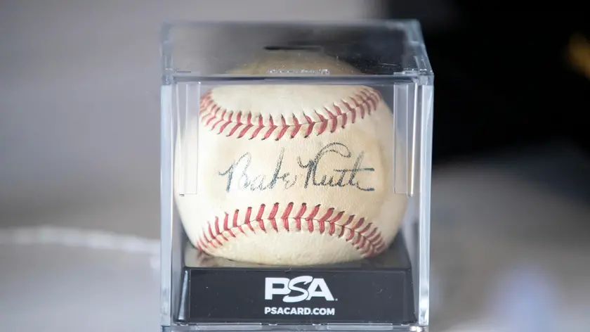 epa10028767 A Babe Ruth signed baseball is displayed, and will be auctioned during the Sports Legends Auction at Julien's Auctions in Beverly Hills, California, USA, 22 June 2022. The auction will take place on 28 June 2022. EPA/ETIENNE LAURENT