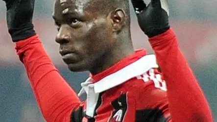 A.C. Milan forward Mario Balotelli (L) celebrates after scoring the 2-0 during the Serie A soccer match between AC Milan and Parma at the Giuseppe Meazza stadium in MIilan, Italy, 15 February 2013. ANSA/DANIEL DAL ZENNARO