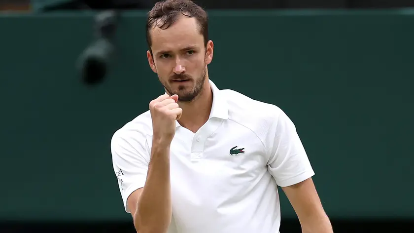 epa11468404 Daniil Medvedev of Russia celebrates a point during the Men's quarterfinal match against Jannik Sinner of Italy at the Wimbledon Championships, Wimbledon, Britain, 09 July 2024. EPA/ADAM VAUGHAN EDITORIAL USE ONLY
