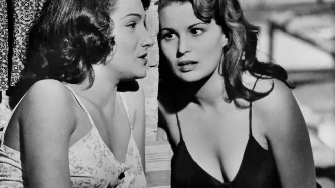 From left to right, American actress Doris DOWLING and Italian actress Silvana MANGANO in the film "Bitter Rice" by Giuseppe De SANTIS. 1950. Contact email: New York : photography@magnumphotos.com Paris : magnum@magnumphotos.fr London : magnum@magnumphotos.co.uk Tokyo : tokyo@magnumphotos.co.jp Contact phones: New York : +1 212 929 6000 Paris: + 33 1 53 42 50 00 London: + 44 20 7490 1771 Tokyo: + 81 3 3219 0771 Image URL: http://www.magnumphotos.com/Archive/C.aspx?VP3=ViewBox_VPage&IID=2S5RYDW4ZSOQ&CT=Image&IT=ZoomImage01_VForm
