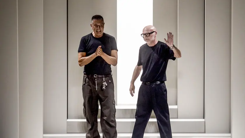 (da sx) Stefano Gabbana e Domenico Dolce al termine della sfilata uomo primavera estate 2025 di Dolce & Gabbana presso il Metropol a Milano, 15 giugno 2024. ANSA/MOURAD BALTI TOUATI