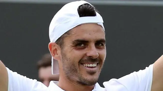 epa06865581 Thomas Fabbiano of Italy celebrates his win over Stan Wawrinka of Switzerland in their second round match during the Wimbledon Championships at the All England Lawn Tennis Club, in London, Britain, 05 July 2018. EPA/SEAN DEMPSEY EDITORIAL USE ONLY/NO COMMERCIAL SALES