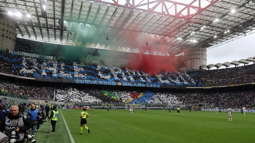 Inter’s supporters display a banner during the Italian serie A soccer match between Fc Inter and Torino at Giuseppe Meazza stadium in Milan, 28 April 2024. ANSA / MATTEO BAZZI
