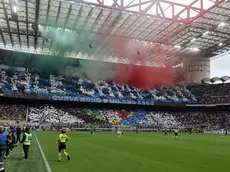 Inter’s supporters display a banner during the Italian serie A soccer match between Fc Inter and Torino at Giuseppe Meazza stadium in Milan, 28 April 2024. ANSA / MATTEO BAZZI