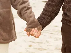 Two Men Holding Hands (New Zealand) --- Image by © Jason Hosking/Corbis