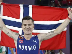 Norway's Jakob Ingebrigtsen celebrates after winning the gold medal at the men's 1500m final during the European Athletics Championships at the Olympic stadium in Rome on June 12, 2024. ANSA/FABIO FRUSTACI