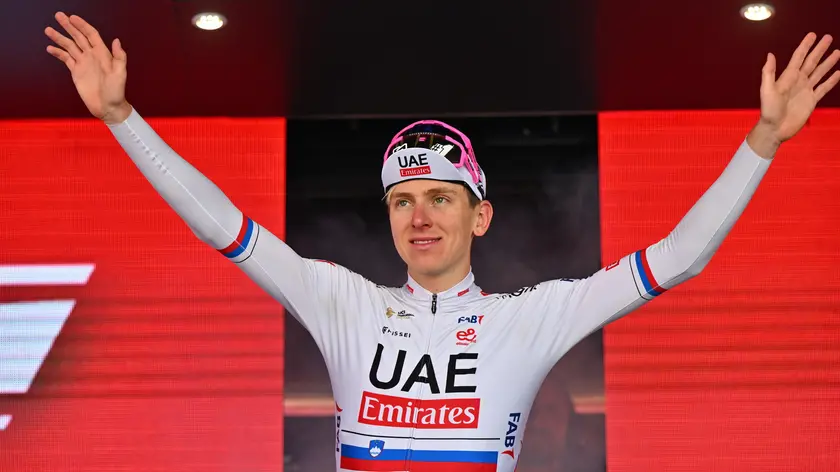 Slovenian rider Tadej Pogacar of Uae Team Emirtaes celebrates on the podium after winning the 20th stage of the 107 Giro d'Italia 2024, cycling race over 184 km from Alpago to Bassano del Grappa, Italy, 25 May 2024. ANSA/LUCA ZENNARO