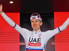Slovenian rider Tadej Pogacar of Uae Team Emirtaes celebrates on the podium after winning the 20th stage of the 107 Giro d'Italia 2024, cycling race over 184 km from Alpago to Bassano del Grappa, Italy, 25 May 2024. ANSA/LUCA ZENNARO