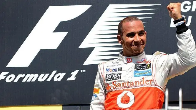 epa03258843 British Formula One driver Lewis Hamilton of McLaren Mercedes celebrates after winning the 2012 Canada Formula One Grand Prix at the Gille Villeneuve circuit in Montreal, Canada, 10 June 2012. EPA/ANDREW GOMBERT