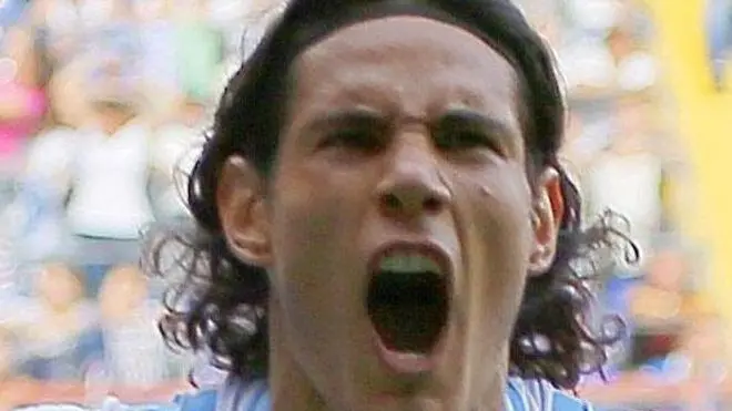 Napoli's Edinson Cavani (L) jubilates after the goal during the Italian Serie A soccer match Sampdoria-Napoli at Luigi Ferraris stadium in Genoa, 30 September 2012. ANSA/ LUCA ZENNARO