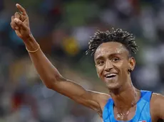 epa10132532 Yemaneberhan Crippa of Italy celebrate after winning Men's 10,000m Final at the Athletics events at the European Championships Munich 2022, Munich, Germany, 21 August 2022. The championships will feature nine Olympic sports, Athletics, Beach Volleyball, Canoe Sprint, Cycling, Artistic Gymnastics, Rowing, Sport Climbing, Table Tennis and Triathlon. EPA/RONALD WITTEK