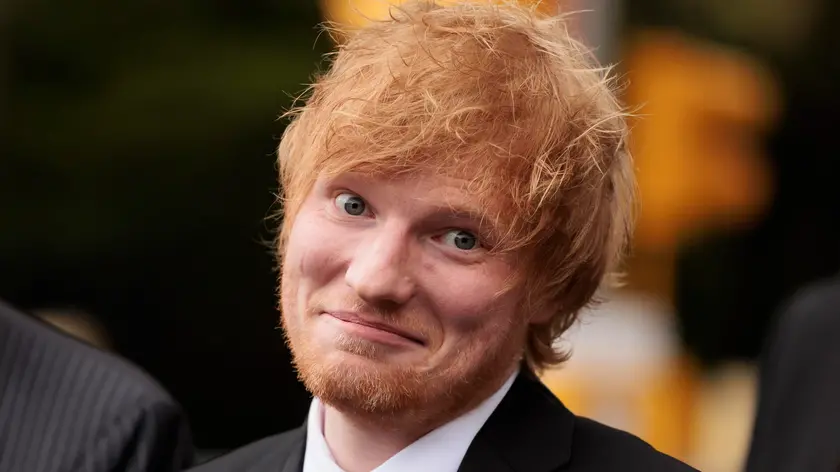 epa10608866 Musician Ed Sheeran standing with his legal team outside of a federal court house after a jury found he had not committed copyright infringement in New York, New York, USA, 04 May 2023. Sheeran had been accused of copying portions of the Marvin Gaye song 'Let’s Get it On', which was co-written by Ed Townsend, in his song 'Thinking Out Loud'. EPA/JUSTIN LANE